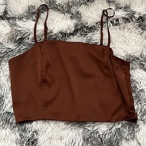 FOREVER 21 it’s a small brown, silk shirt